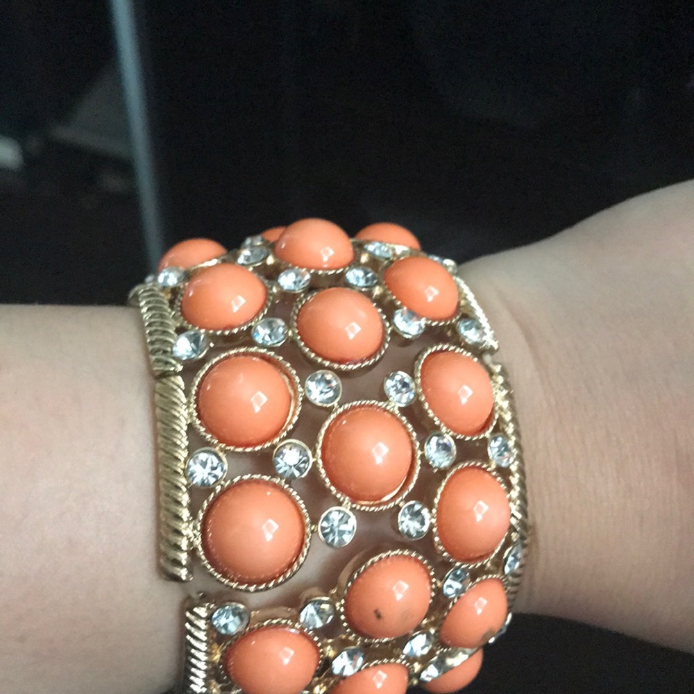Beautiful peach color and gold bracelet